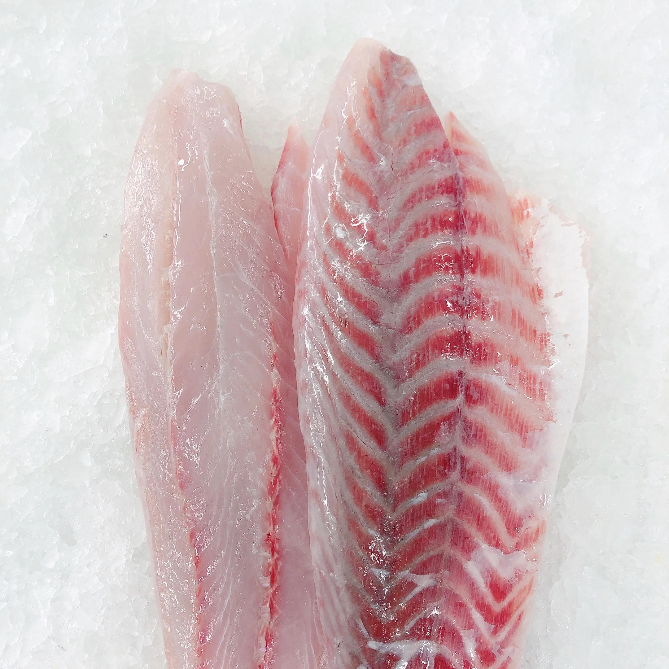 BARRAMUNDI SIDES SKINLESS FILLETS (MIN 500G)